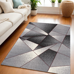 HomeRoots 4' Modern Grey Red Geometric Area Rug - Stylish, Durable Design for Living Rooms and Bedrooms 5x8 390335