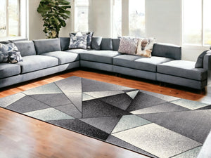 HomeRoots 4' Modern Grey Red Geometric Area Rug - Stylish, Durable Design for Living Rooms and Bedrooms 7x10 390336