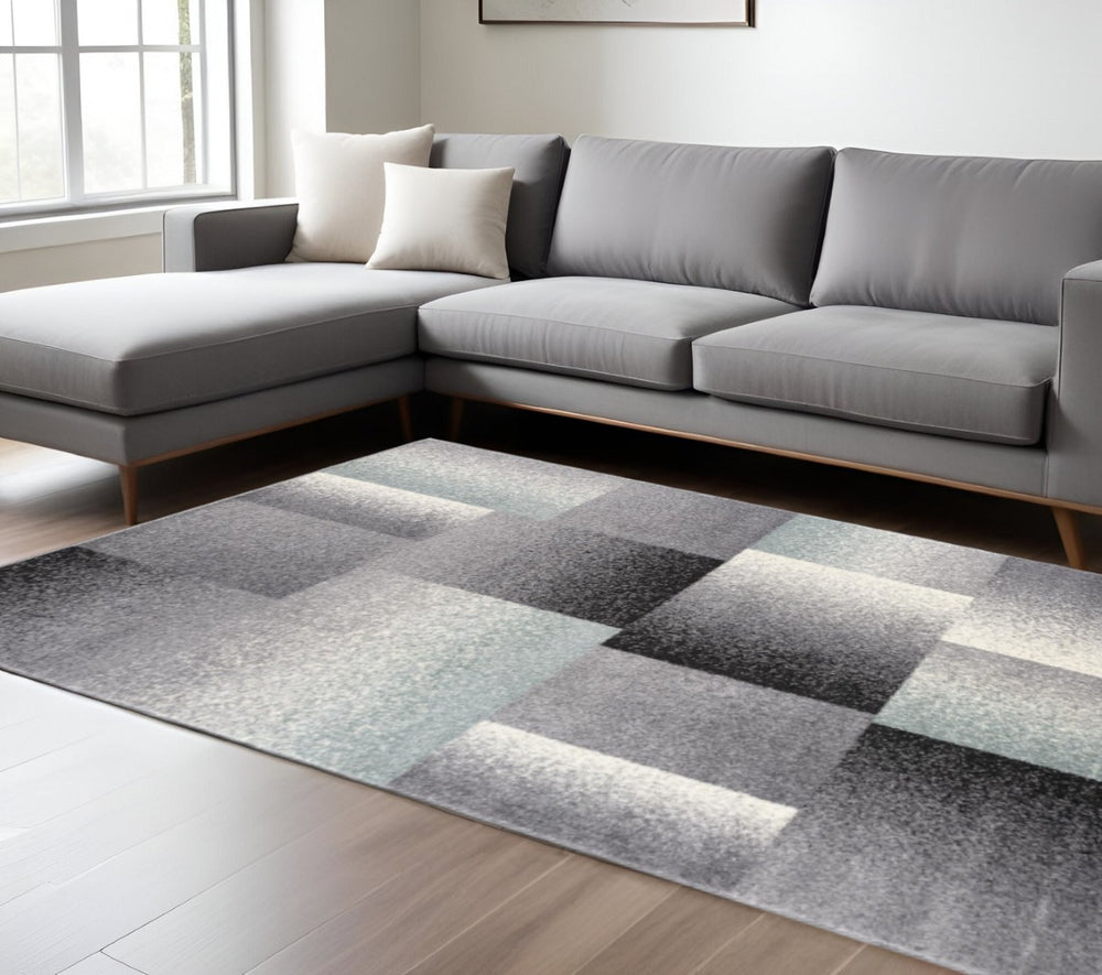 HomeRoots 4' Modern Geometric Area Rug - Stylish Charcoal and Teal Design for Contemporary Home Décor 7' X 9' Rectangle 390341