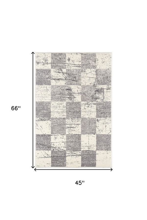 HomeRoots 4' Timeless White and Gray Checkered Area Rug for Stylish Living Spaces, Soft, Durable, and Versatile 4' X 6' Rectangle 390343