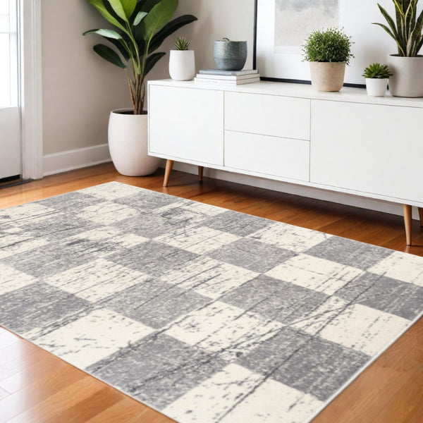 HomeRoots 4' Timeless White and Gray Checkered Area Rug for Stylish Living Spaces, Soft, Durable, and Versatile 4' X 6' Rectangle 390343