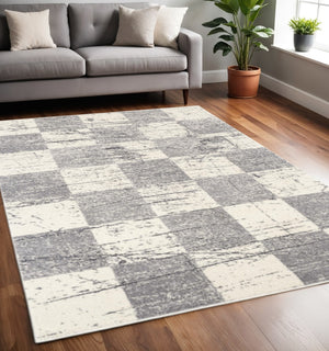 HomeRoots 4' Timeless White and Gray Checkered Area Rug for Stylish Living Spaces, Soft, Durable, and Versatile 5' X 8' Rectangle 390345