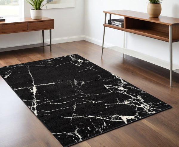Homeroots 4' X 6' Black And White Abstract Breakage Area Rug  Polyester 390348