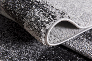 HomeRoots 7' Gray Distressed Geometric Area Rug – Handcrafted for Modern Elegance and Comfort in Any Space 7' X 9' 390356