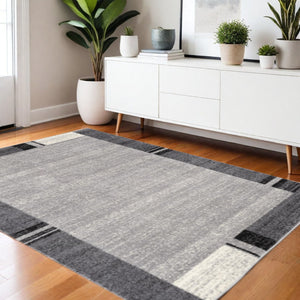 HomeRoots 4' Modern Bordered Area Rug - Elegant Dove-Gray Design for Comfort in Living, Dining, or Bedroom Spaces 4x6 390366