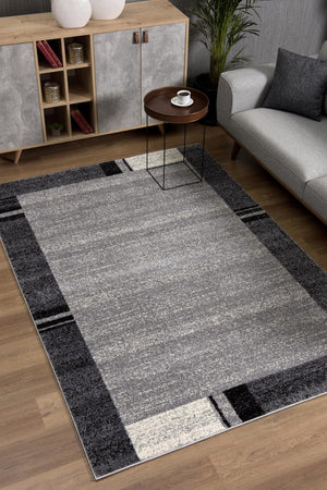 HomeRoots 4' Modern Bordered Area Rug - Elegant Dove-Gray Design for Comfort in Living, Dining, or Bedroom Spaces 5x8 390368