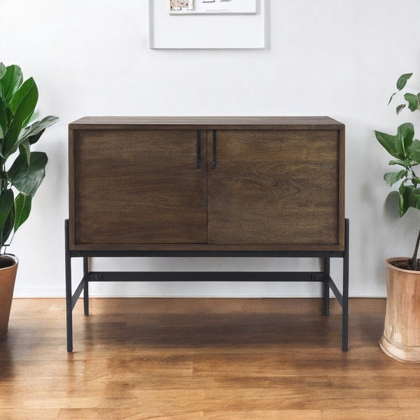 HomeRoots Dark Two-Door Storage Cabinet with Metal Legs – Rustic Charm Meets Modern Design for Any Room 391990