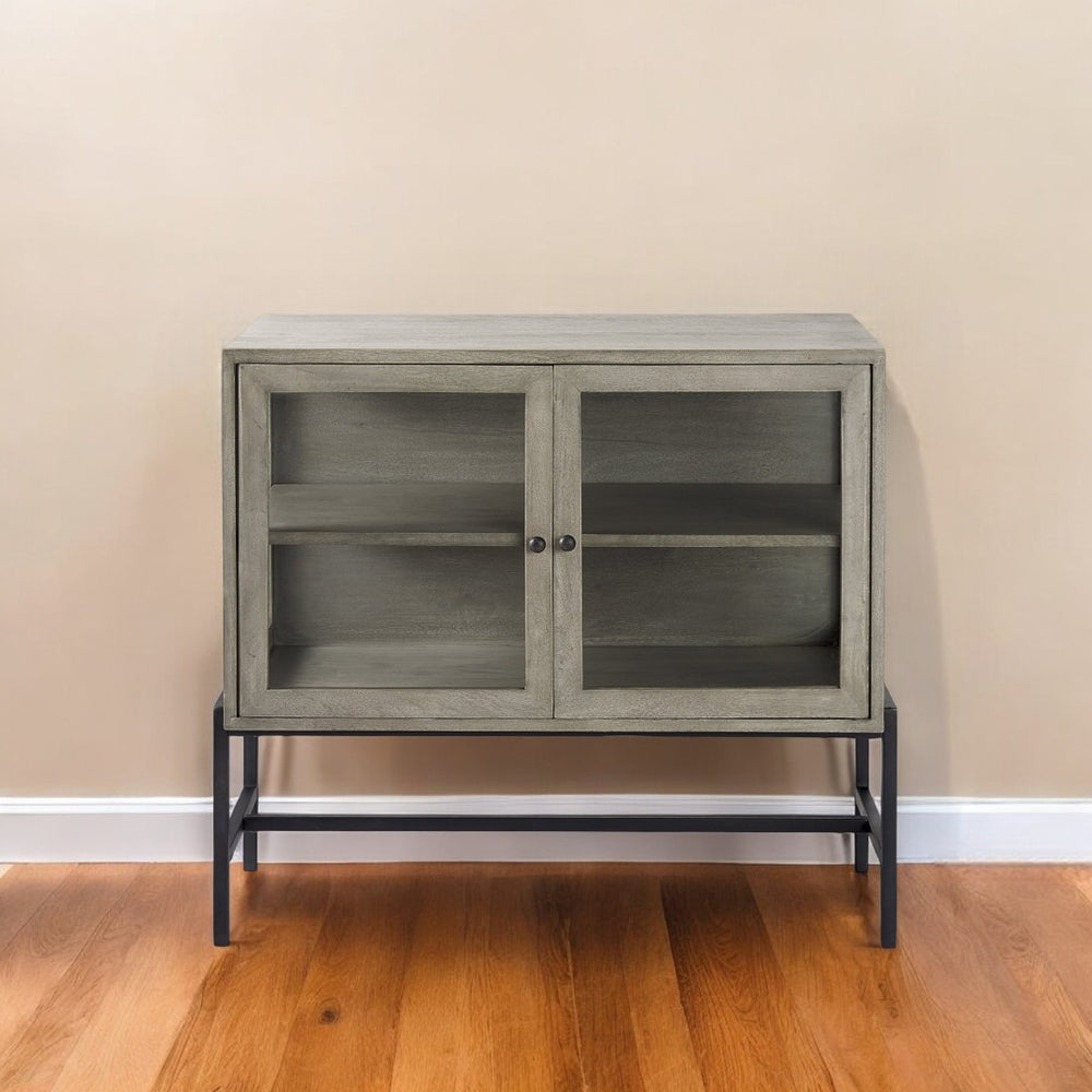 HomeRoots 38" Solid Wood Sideboard with Elegant Glass Doors - Modern Storage Solution for Any Room Gray 391991