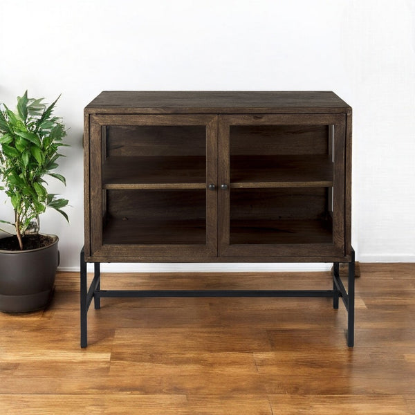 HomeRoots 38" Solid Wood Sideboard with Elegant Glass Doors - Modern Storage Solution for Any Room Medium Brown 391993