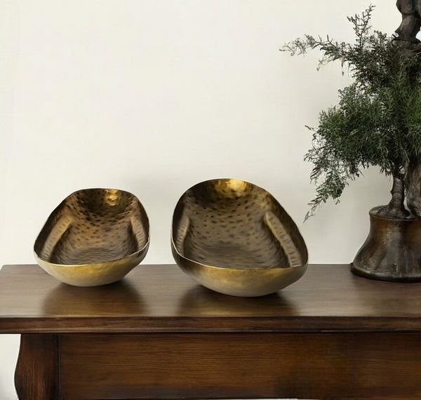 HomeRoots Set of Two Gold Hammered Metal Bowls - Stylish Boat-Shaped Decor for Modern & Rustic Spaces 392172