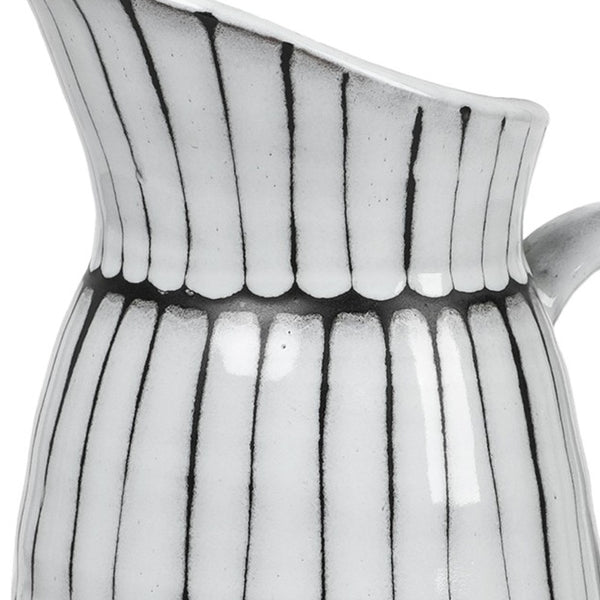 Homeroots 13" White And Black Artisan Glaze Ceramic Pitcher  Ceramic 392198