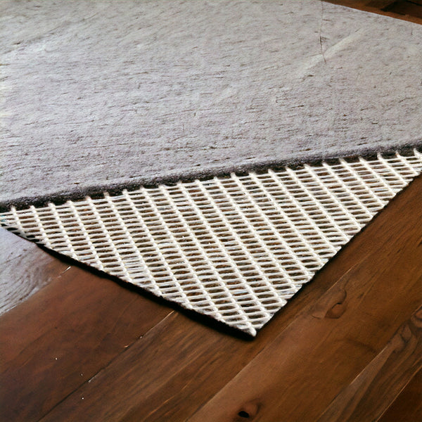 Homeroots 8' X 11' Ivory Queen's Supreme Non Slip Rug Pad  Polyvinyl Chloride 392333