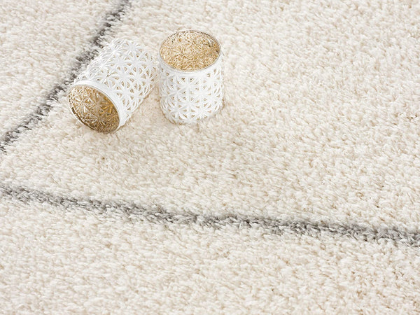 Homeroots 7' X 9' Ivory Modern Uneven Lattice Area Rug  Polyester 392339