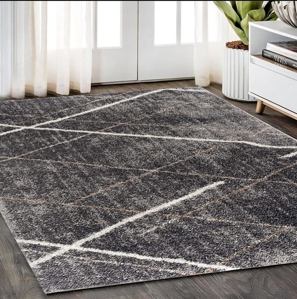 Homeroots 5' X 8' Gray Modern Distressed Lines Area Rug  Polyester 392343