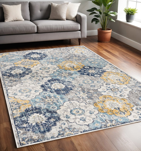 HomeRoots 20' Vibrant Blue and Yellow Floral Runner Rug - Durable, Stylish Design for High-Traffic Spaces 5’ x 8’ 392917