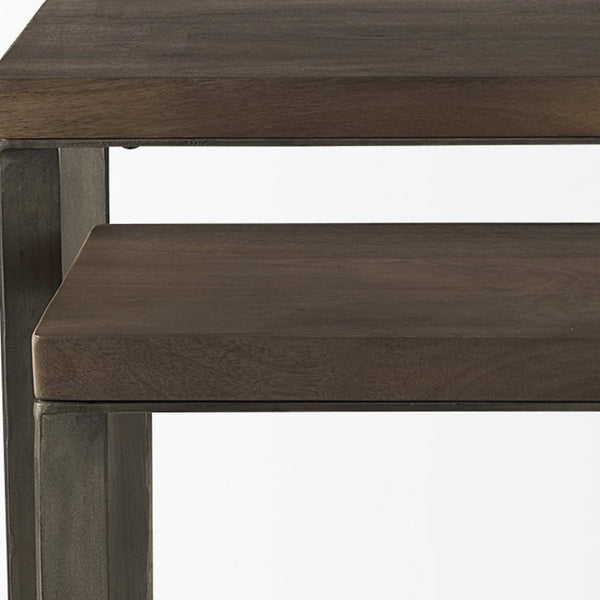 HomeRoots Set of Two Versatile Brown Solid Wood & Metal Nesting Tables with Chic Cross Legs for Modern Spaces 393190