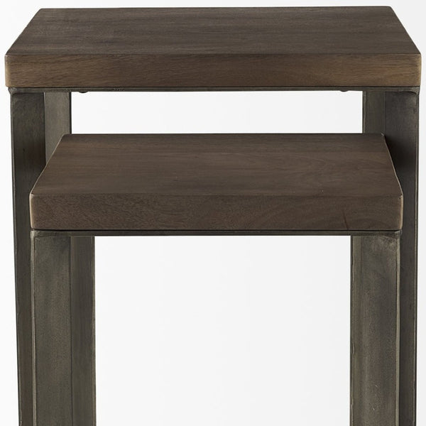 HomeRoots Set of Two Versatile Brown Solid Wood & Metal Nesting Tables with Chic Cross Legs for Modern Spaces 393190