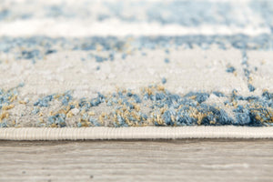 HomeRoots 4' Blue and Ivory Abstract Area Rug - Contemporary Power Loomed Design for Modern Elegance 4' X 6' 393211