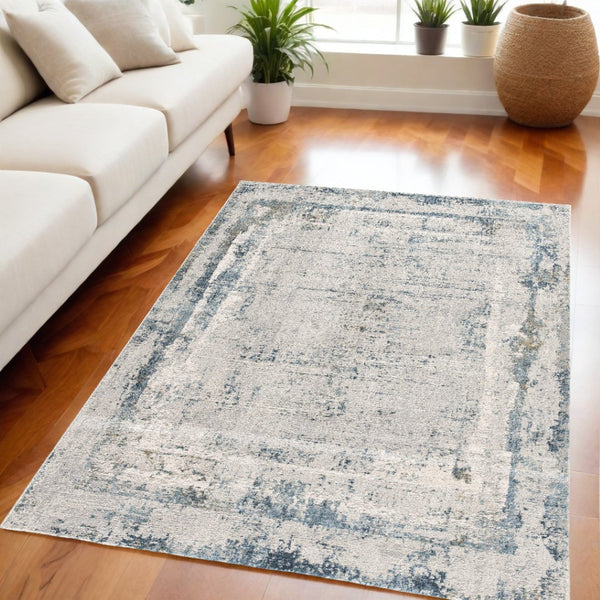 HomeRoots 4' Blue and Ivory Abstract Area Rug - Contemporary Power Loomed Design for Modern Elegance 5' X 7' 393212