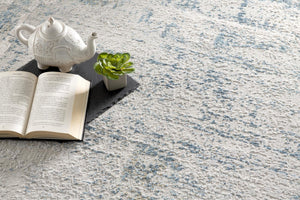 HomeRoots 4' Blue and Ivory Abstract Area Rug - Contemporary Power Loomed Design for Modern Elegance 6' X 9' 393213