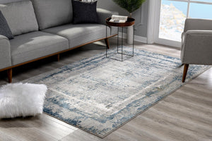 HomeRoots 4' Blue and Ivory Abstract Area Rug - Contemporary Power Loomed Design for Modern Elegance 8' X 10' 393214