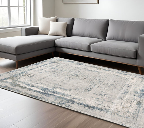 HomeRoots 4' Blue and Ivory Abstract Area Rug - Contemporary Power Loomed Design for Modern Elegance 8' X 10' 393214