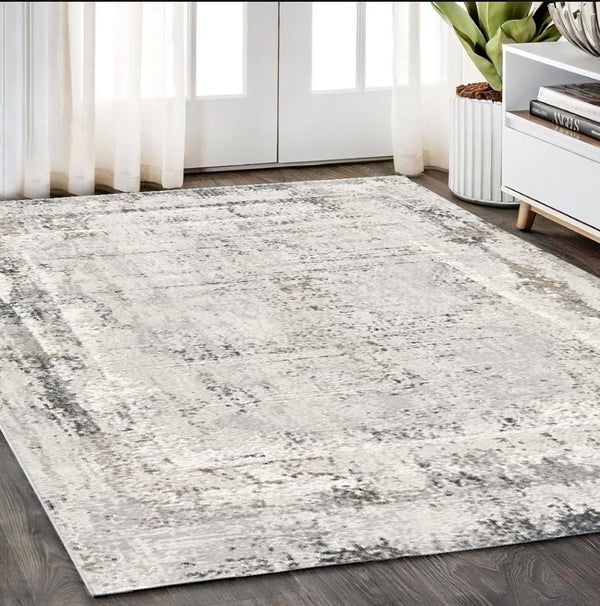 HomeRoots 4' Gray and Ivory Abstract Area Rug - Contemporary Power Loom Design for Modern Living Spaces 5' X 8' 393216