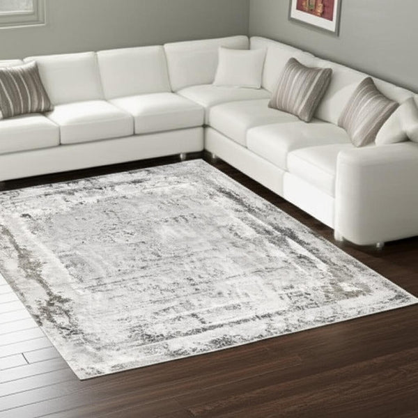 HomeRoots 4' Gray and Ivory Abstract Area Rug - Contemporary Power Loom Design for Modern Living Spaces 7' X 10' 393217