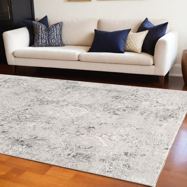 HomeRoots 4' Gray and Ivory Abstract Power Loom Area Rug for Modern Elegance in Living Rooms and Offices 6' X 9' 393229