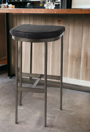 Homeroots 30" Black And Gold Faux Leather Backless Counter Height Bar Chair   393455