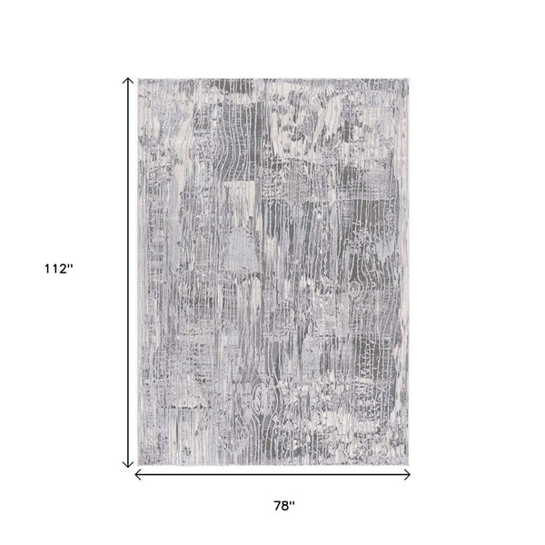 HomeRoots 10' Blue Abstract Power Loom Runner Rug - Stylish, Durable Design for High-Traffic Hallways & Entryways 6' X 9' 393529
