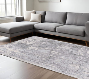 HomeRoots 10' Blue Abstract Power Loom Runner Rug - Stylish, Durable Design for High-Traffic Hallways & Entryways 6' X 9' 393529