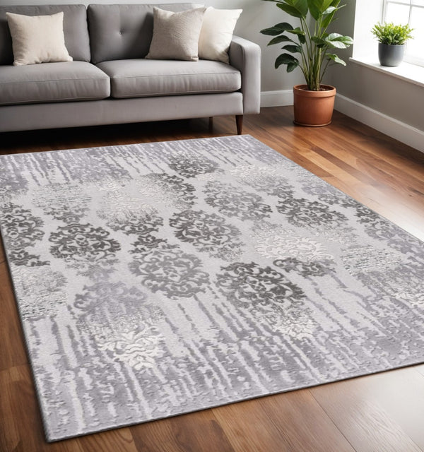 HomeRoots 4' Gray and Ivory Damask Area Rug - Timeless Elegance and Comfort for Any Room's Décor Style 5' X 7' 393575