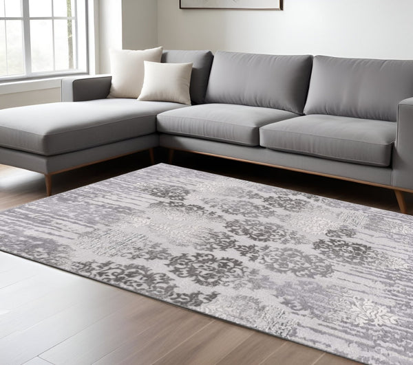 HomeRoots 4' Gray and Ivory Damask Area Rug - Timeless Elegance and Comfort for Any Room's Décor Style 8' X 10' 393577