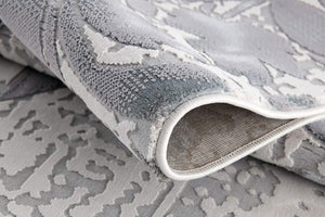 HomeRoots 5' Gray and Ivory Damask Area Rug – Elegant Power Loomed Design for Luxurious Comfort and Style 5' X 7' 393580