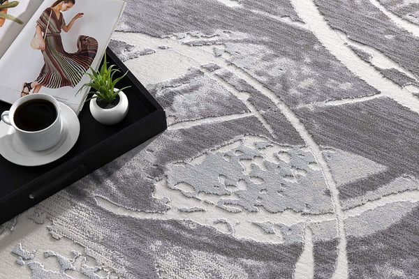 HomeRoots 5' Gray Abstract Area Rug - Contemporary Power-Loomed Design for Modern Living Spaces and Comfort 6' X 9' 393586