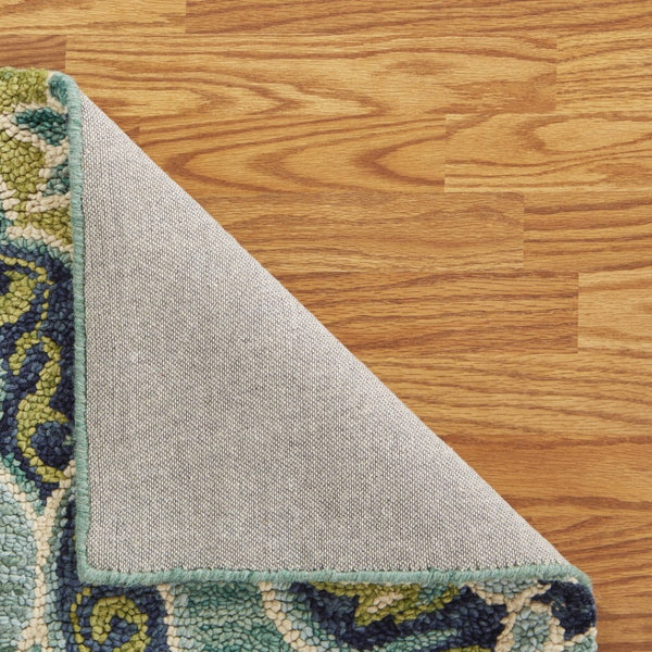 HomeRoots 6' Green and Ivory Wool Geometric Hand-Tufted Rug - Artisan Craftsmanship for Modern Comfort Spaces 6' Round 393656