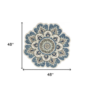 Homeroots 4' Blue And Cream Round Wool Floral Medallion Hand Tufted Area Rug Ivory Wool 393675