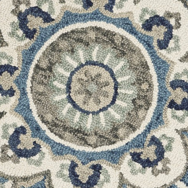 Homeroots 4' Blue And Cream Round Wool Floral Medallion Hand Tufted Area Rug Ivory Wool 393675