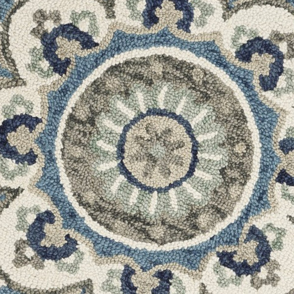 Homeroots 4' Blue And Cream Round Wool Floral Medallion Hand Tufted Area Rug Ivory Wool 393675