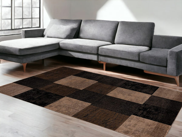 Homeroots 5' X 7' Brown Checkered Dhurrie Area Rug  Polypropylene 393787