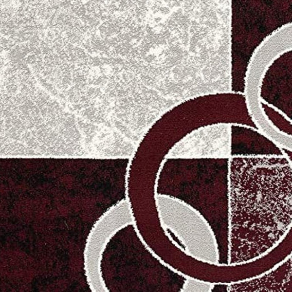HomeRoots 10' Contemporary Red and White Abstract Runner Rug - Durable, Stain-Resistant Design for High Traffic Areas 2' x 13' 393870