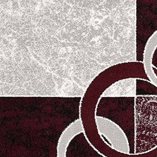 HomeRoots 10' Contemporary Red and White Abstract Runner Rug - Durable, Stain-Resistant Design for High Traffic Areas 2' x 20' 393872