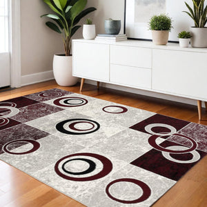 HomeRoots 10' Contemporary Red and White Abstract Runner Rug - Durable, Stain-Resistant Design for High Traffic Areas 4' X 6' 393885