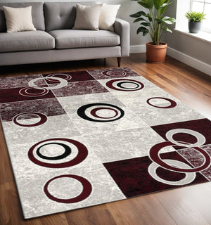 HomeRoots 10' Contemporary Red and White Abstract Runner Rug - Durable, Stain-Resistant Design for High Traffic Areas 5' X 7' 393886