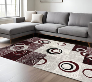 HomeRoots 10' Contemporary Red and White Abstract Runner Rug - Durable, Stain-Resistant Design for High Traffic Areas 6' X 9' 393887