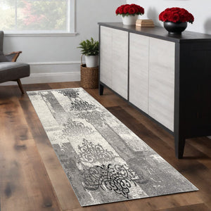 Homeroots 2' X 8' Gray Faded Filigree Pattern Runner Rug  Olefin 393897