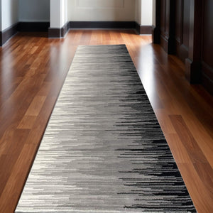HomeRoots 2' Transitional Striped Runner Rug - Stylish Black, Gray, and White Design for Hallways and Entryways 2' x 10' 393924