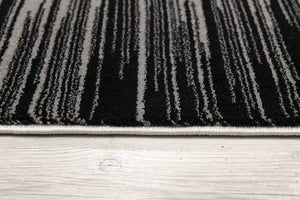 Homeroots 5' X 7' Black Abstract Dhurrie Area Rug  Polypropylene 393935