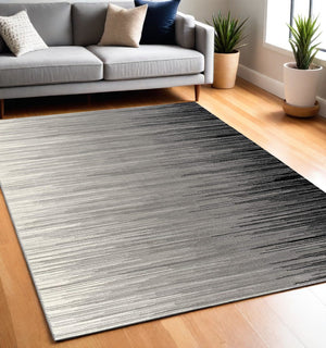 Homeroots 5' X 7' Black Abstract Dhurrie Area Rug  Polypropylene 393935
